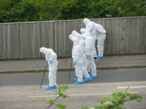 Police forensic officers search the area in Willowbrae. (Picture: Cameron McHenry)