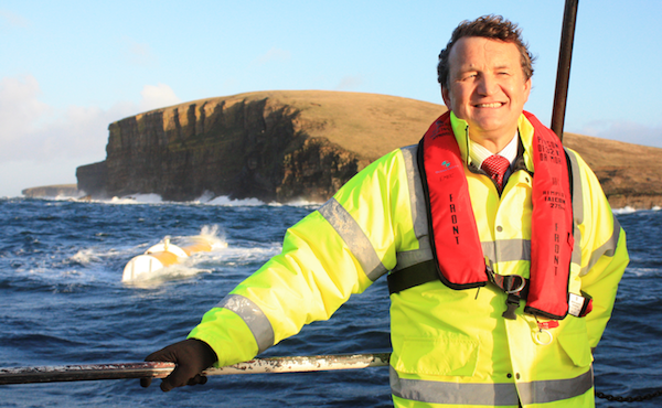 Martin McAdam CEO Aquamarine Power and the Oyster wave energy machine (Copyright Orkney Media Group)