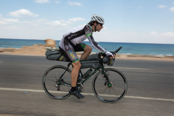 Scottish adventurer Mark Beaumont departs Cairo Tower through the streets of the city, accompanied by fellow riders, to begin his Africa Solo expedition to try and set the Cairo to Cape Town World (speed) record, in Cairo, Egypt, 10 April 2015.