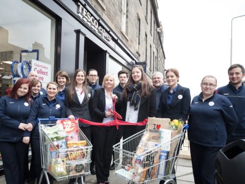 Store manager Karen Marshall with colleagues and Hannah Mitchell from the Yard Charity - small