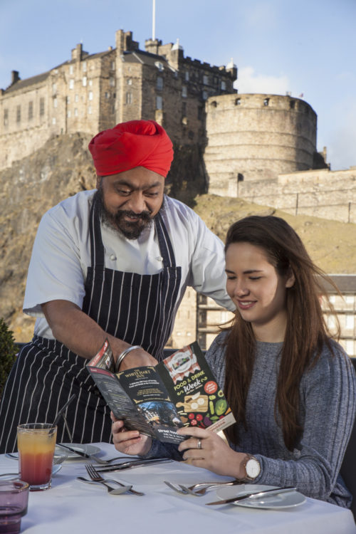 Tony Singh with one of his diners Claudia Cross