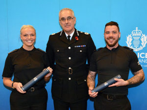 Constables Alan Kerr and Heather Ferry, who pursued and disarmed a suspect carrying a petrol bomb, with Chief Constable Gormley