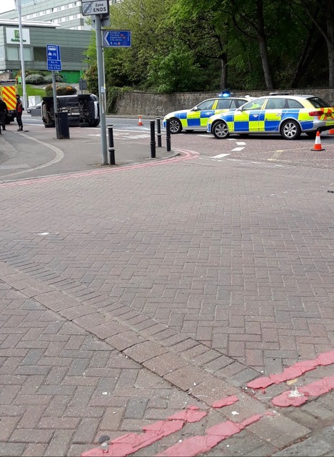 Overturned car on St John's Road with police in attendance