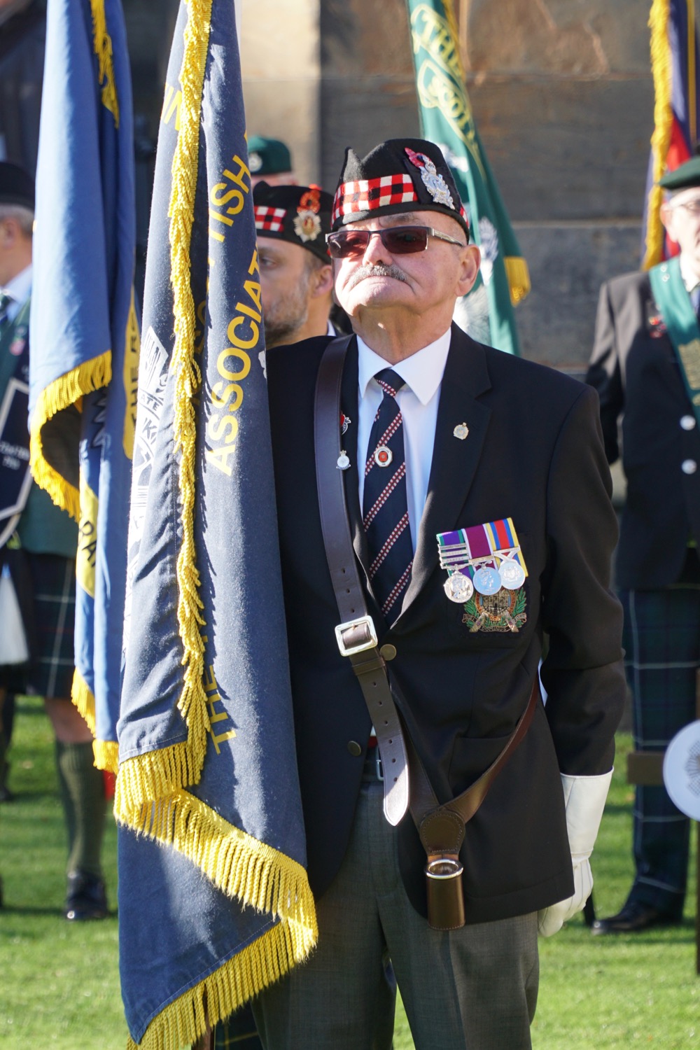 A standard bearer at the Garden of Remembrance opening ceremony 2018