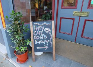 A board outside The Happy Cafe