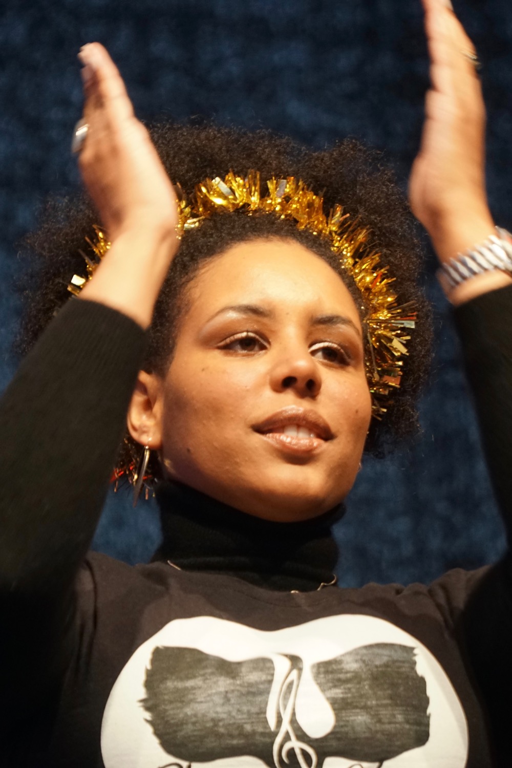 Singer with tinsel in her hair