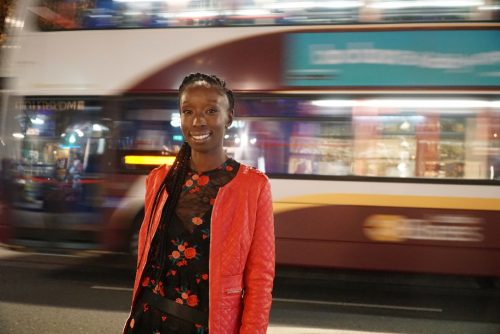 Headshot of Eunice Olumide with Lothian Bus behind