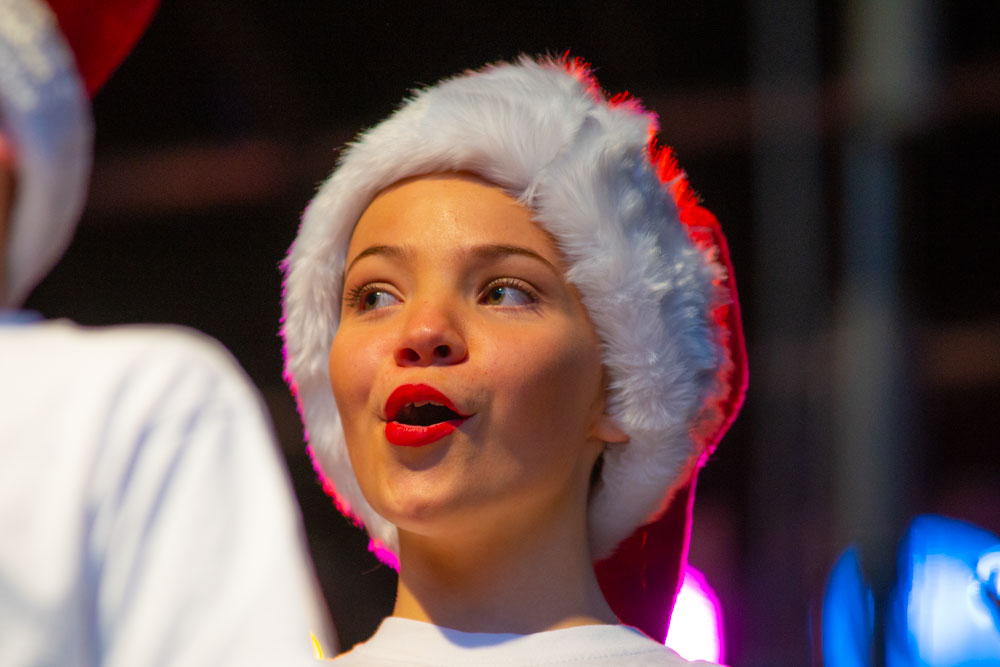 Singer wearing Xmas hat