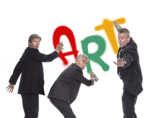 Three actors pose with the word ART