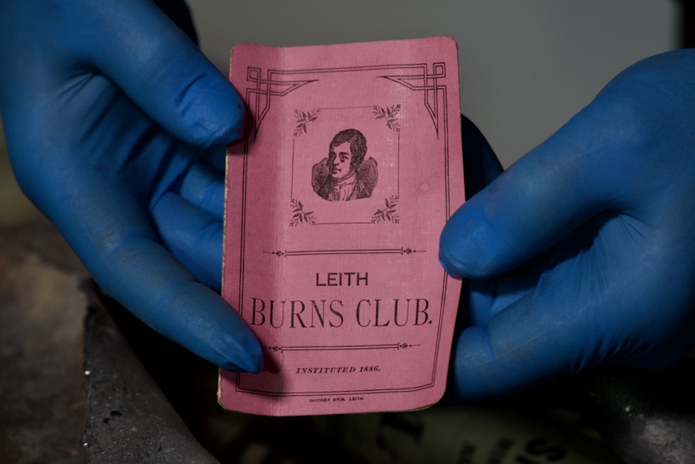 Pink booklet with the words Leith Burns Club on the front