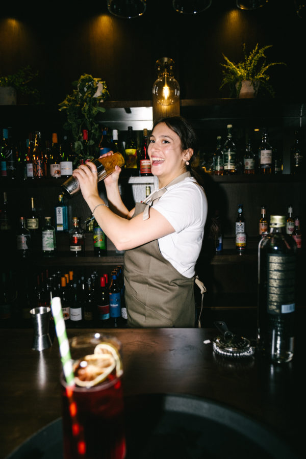 waitress shaking a cocktail