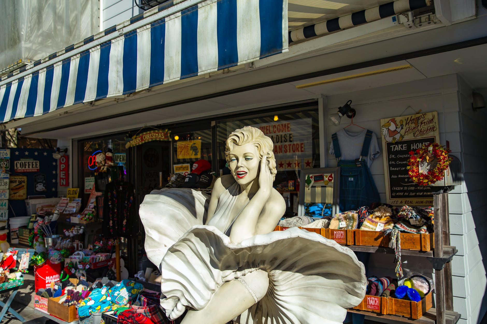 white concrete statue of a woman