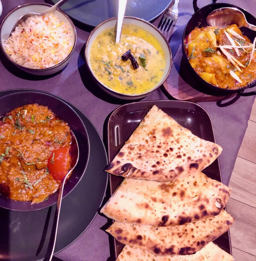 A selection of Indian curries and breads